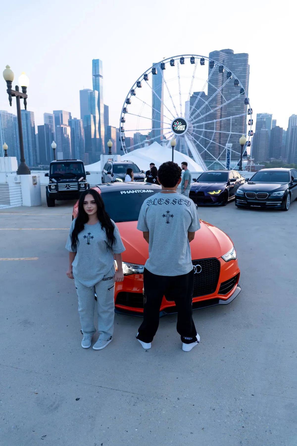 PHANTOM4 crew with an orange Audi at Navy Pier, Chicago